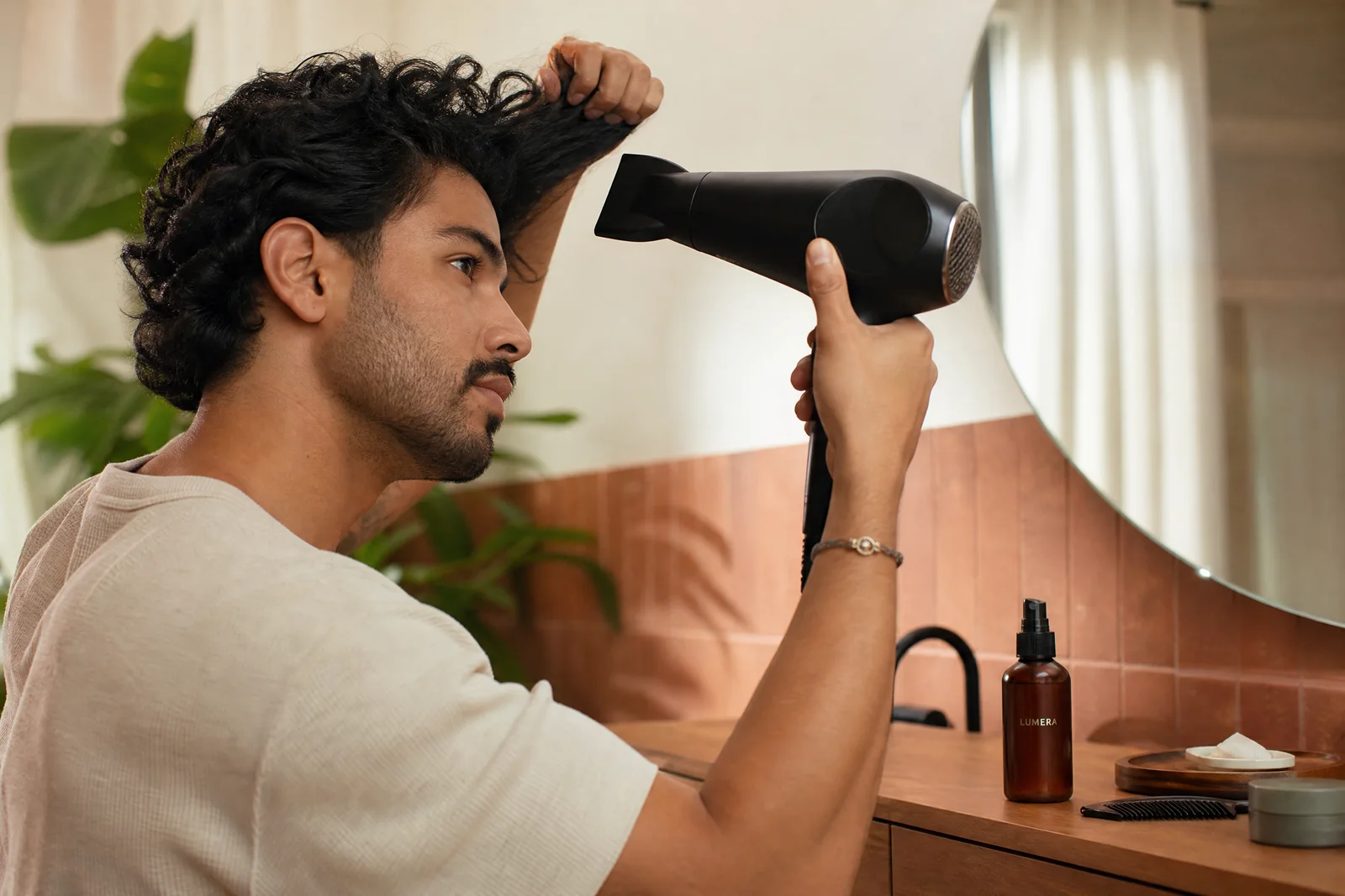 Heat Styling: How to Lower the Stress on Your Hair editorial photo